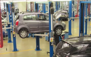 Two-post hydraulic vehicle lift